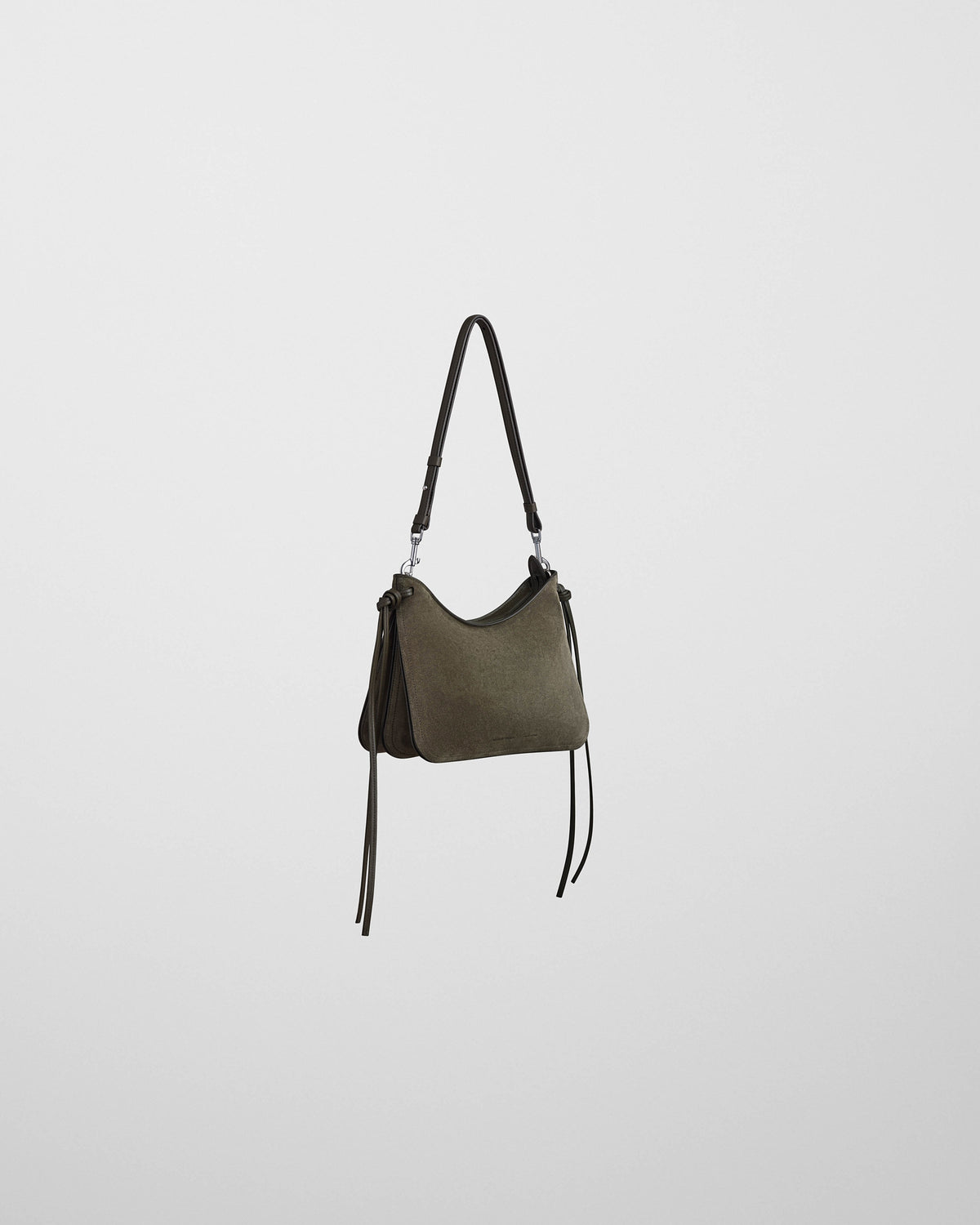 Phoebe Philo sac Gig porté épaule en daim kaki, vue trois quarts avec hardware argenté et franges latérales