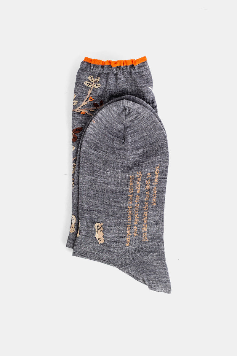 Antipast chaussettes femme grises pliées vue semelle intérieure beige et ceinture élastique orange