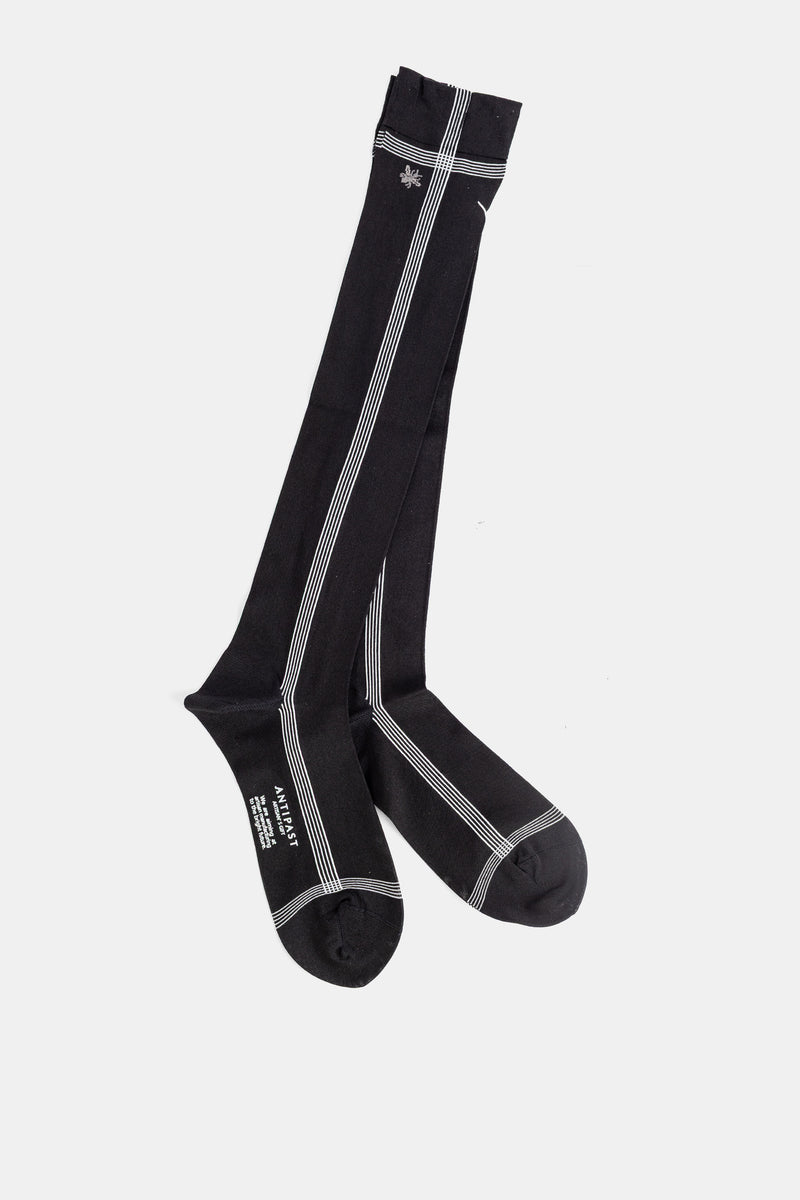 Antipast chaussettes hautes noires à rayures fines écrues en jersey fin, broderie au revers, montantes jusqu'au genou