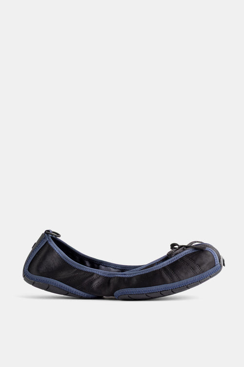 Ballerines sneakers noires à liseré bleu marine