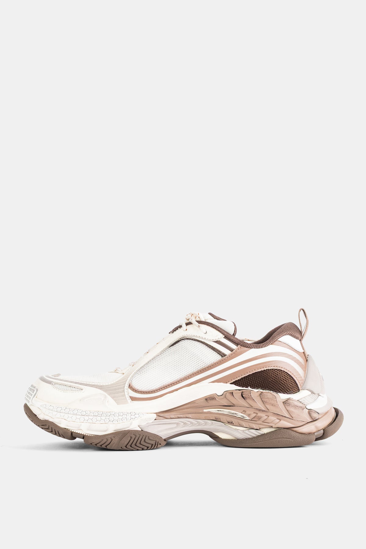 Balenciaga Triple S 2 profil latéral gauche avec empiècements mesh blanc et bandes cuir marron sur semelle sculptée