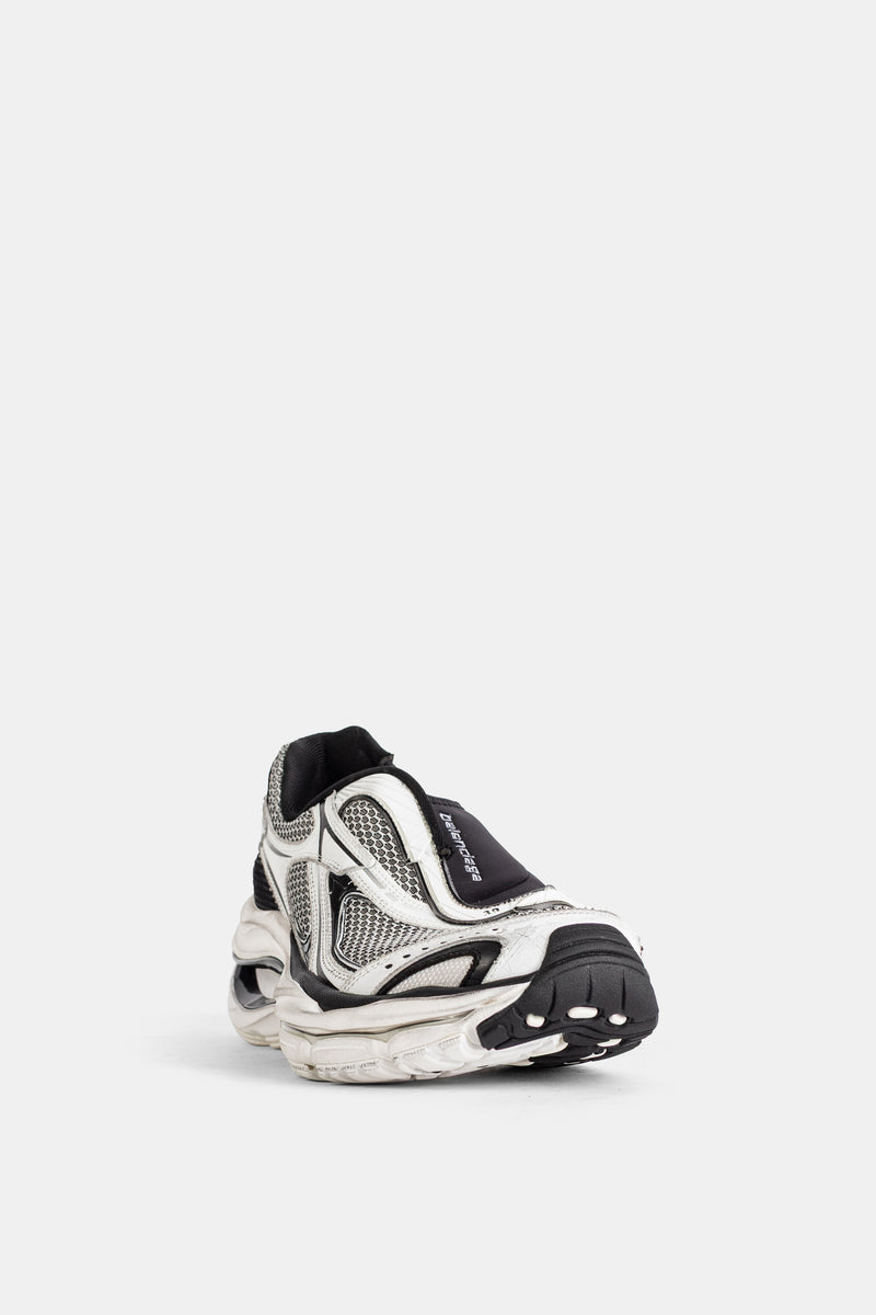 Balenciaga men's D'Orsay sneakers in white hexagonal mesh with a black rubber toe cap, three-quarter front view.