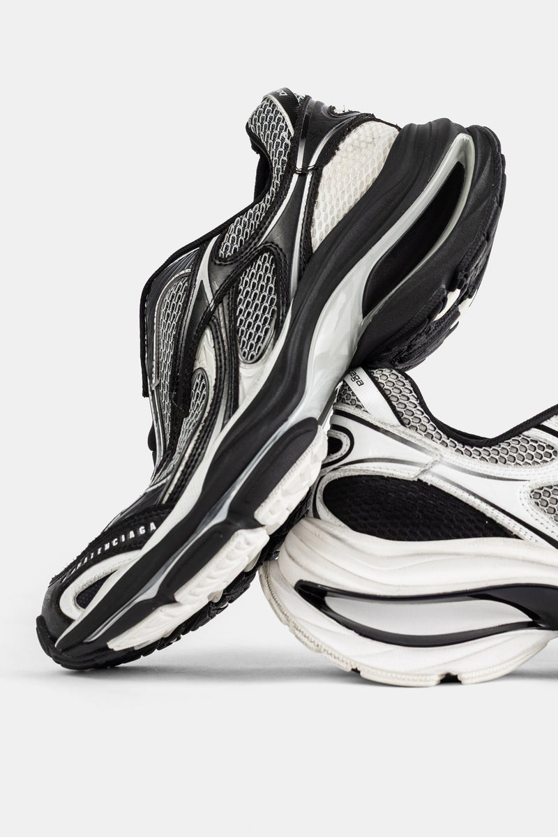 Balenciaga men's D'Orsay slip-on layered pair, chunky black and white sole, grey mesh overlays, close-up view.