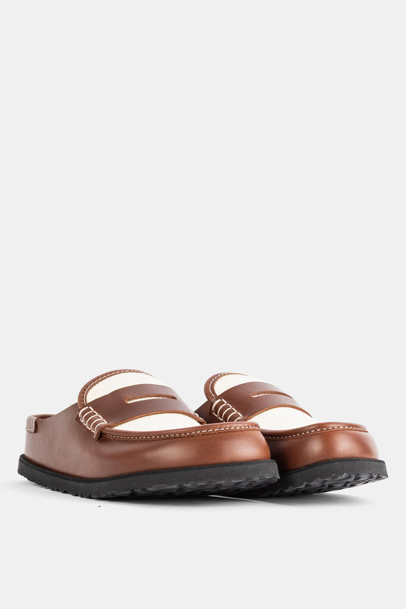Sabot Birkenstock 1774 Naples Cinnamon vista da dietro, pelle cognac, feltro crema e suola nera dentata.
