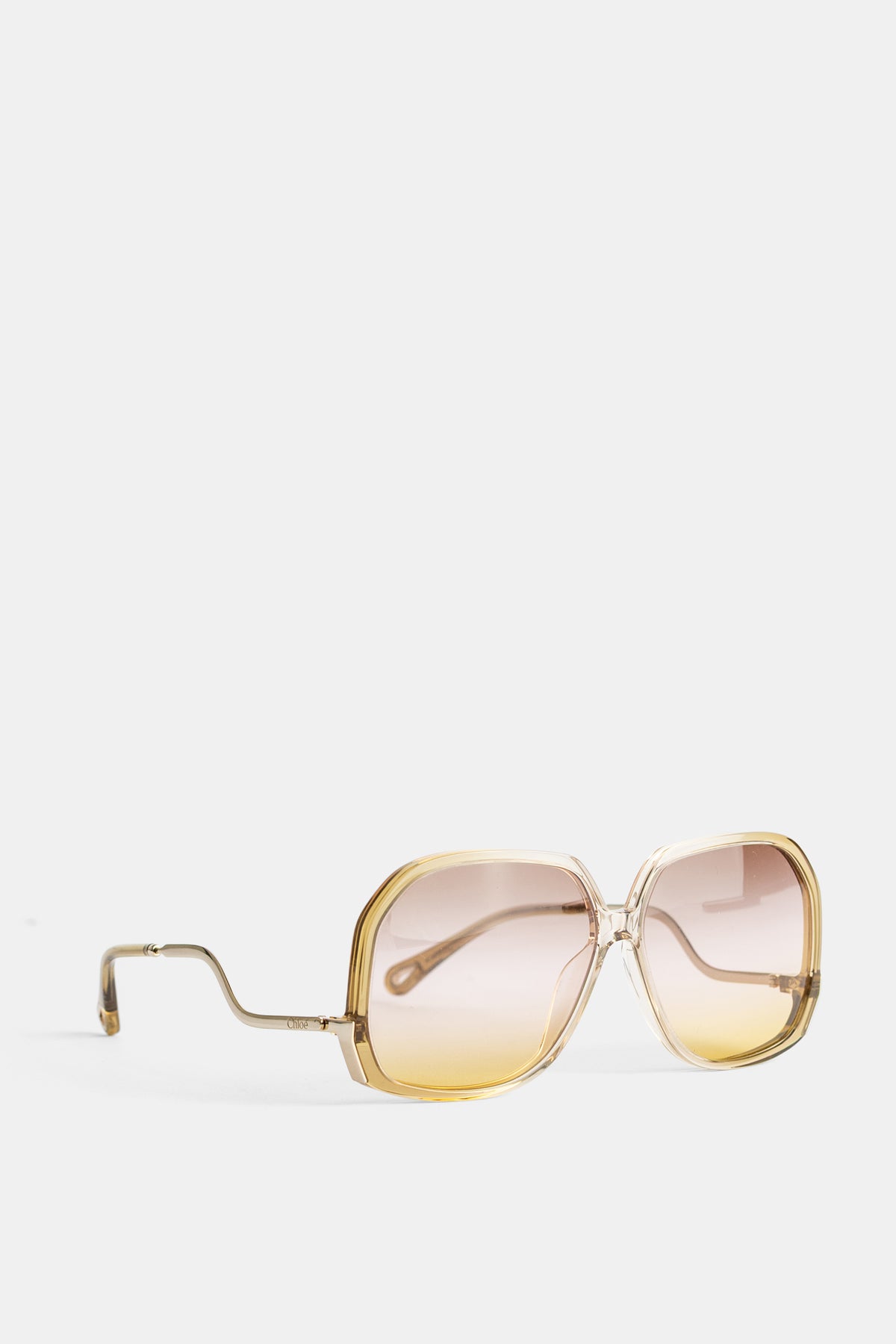 Lunettes de soleil oversize miel à branches ondulées Chloé