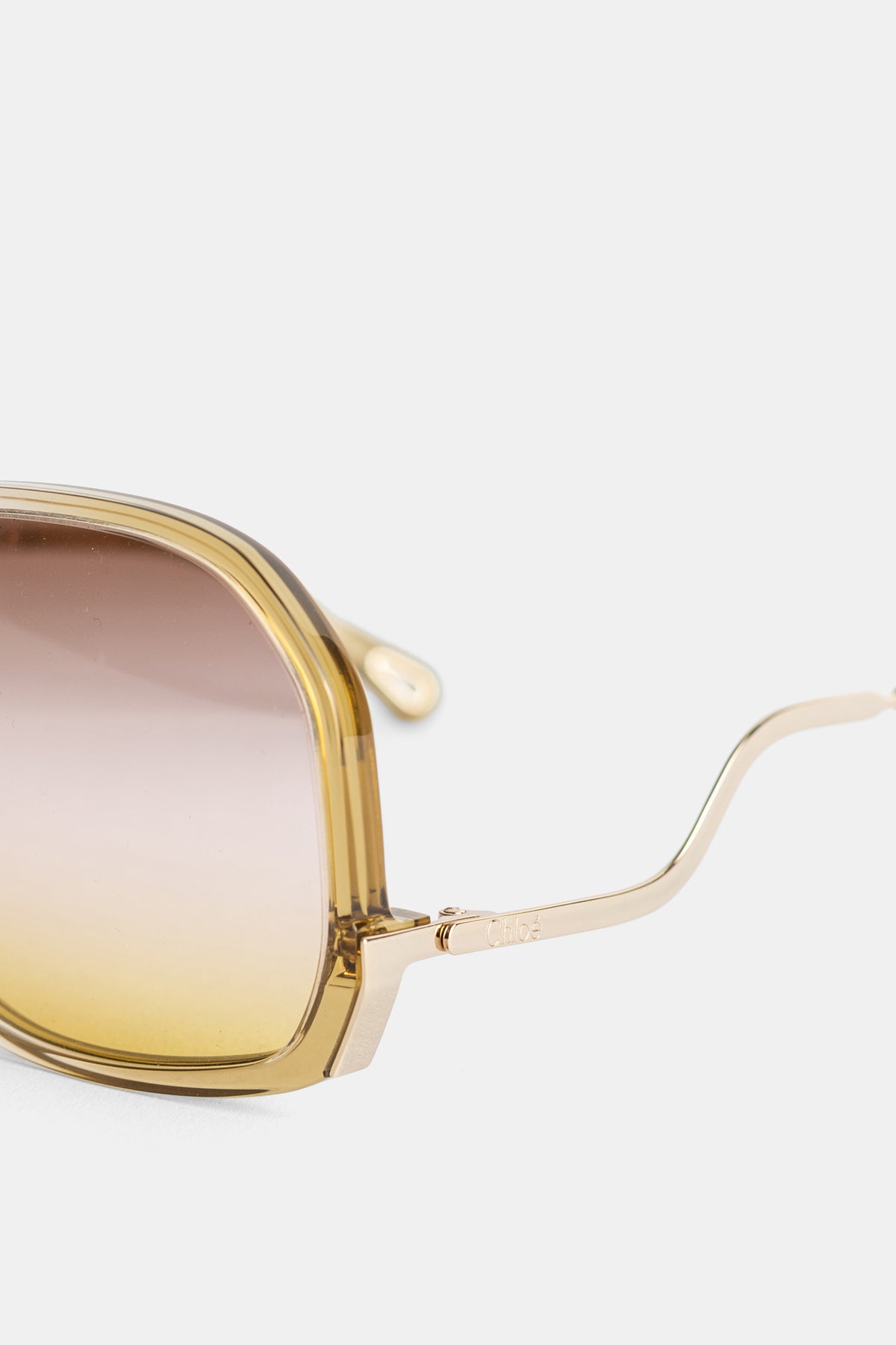 Lunettes de soleil oversize miel à branches ondulées Chloé