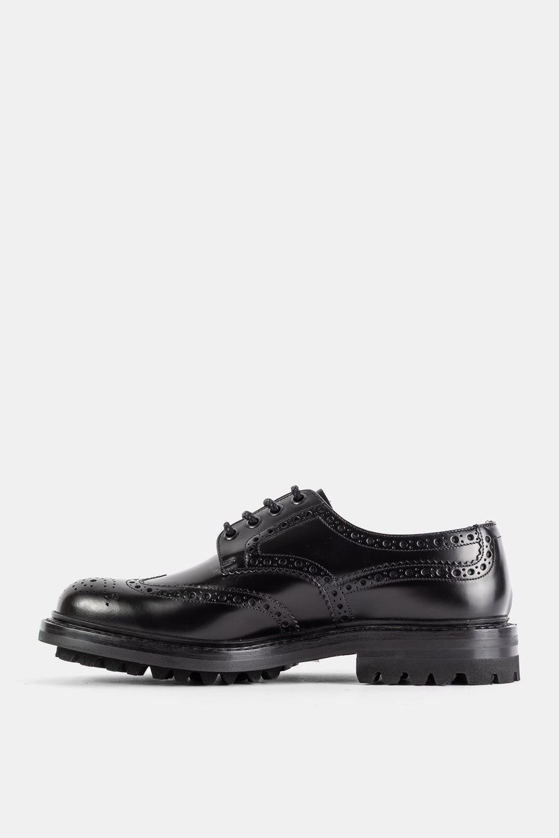 Church's derby brogue Mc Pherson noir vue latérale profil gauche avec semelle lug crantée et tige cuir brillant