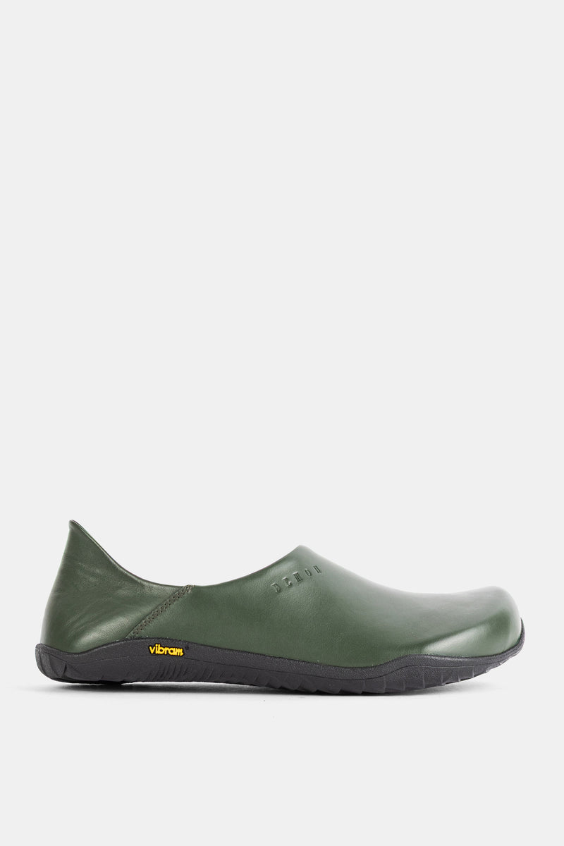 Demon Dalmara mule in forest green smooth leather, round toe and black Vibram sole, profile view.