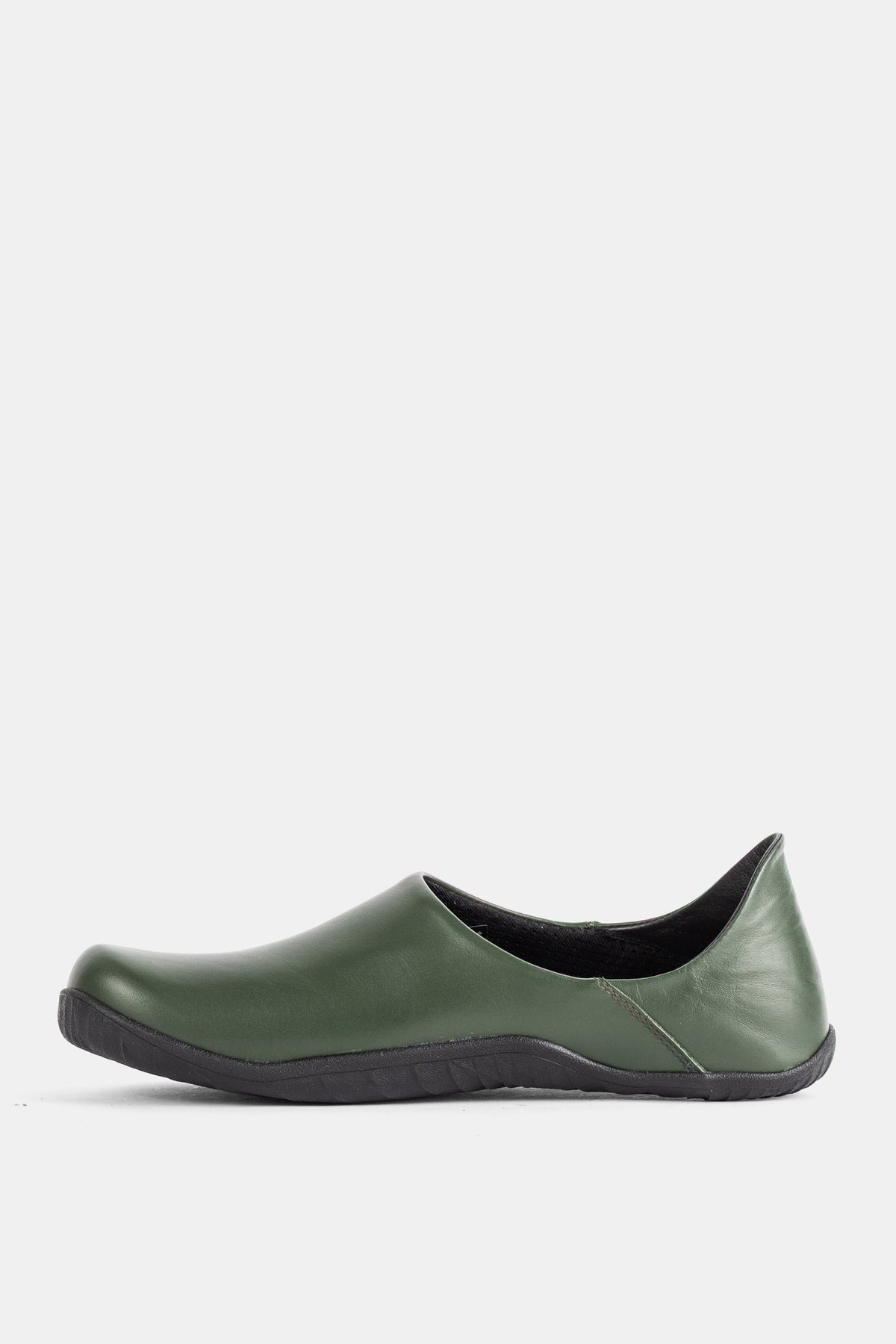 Bottle green leather Demon Dalmara mule, side view highlighting clean lines and flat black Vibram sole.