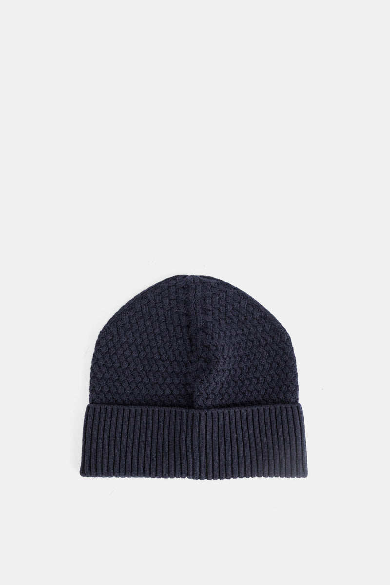 Bonnet en maille torsadée marine à patch logo