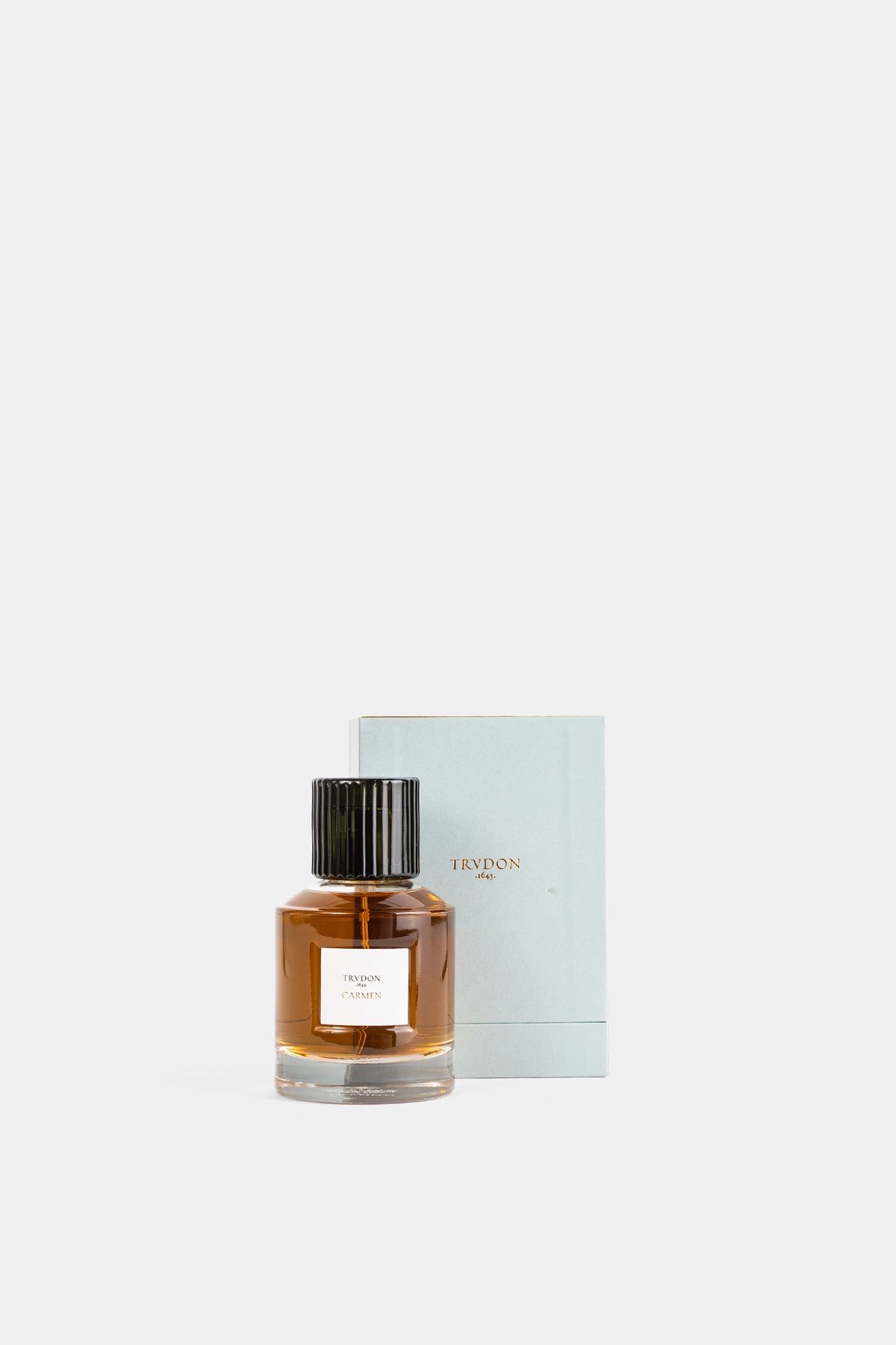 Trudon Carmen parfum 100 ml présenté avec son coffret bleu pastel, duo flacon et boîte luxe