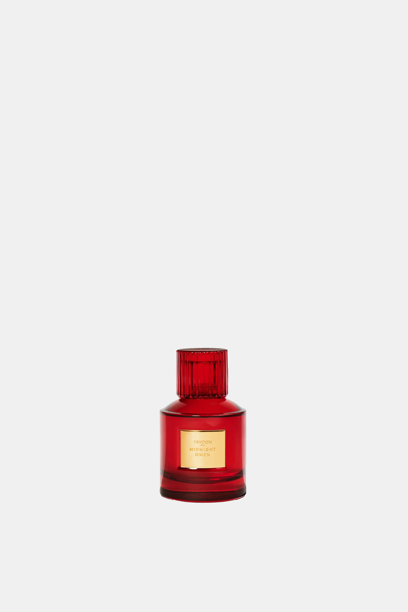 Trudon Midnight Omen 100 ml eau de parfum in a carmine red glass bottle with a fluted cap and gold plate