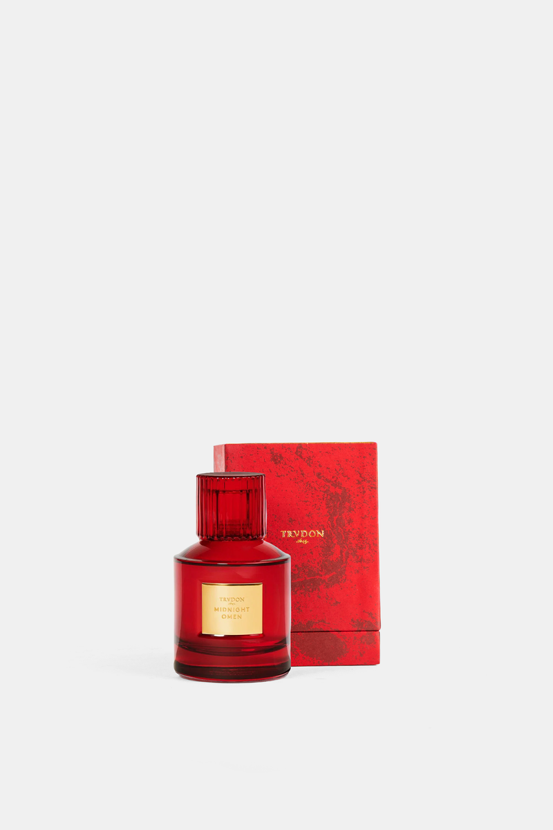 Trudon Midnight Omen unisex perfume with its marbled red box and elegant gold lettering, luxury presentation