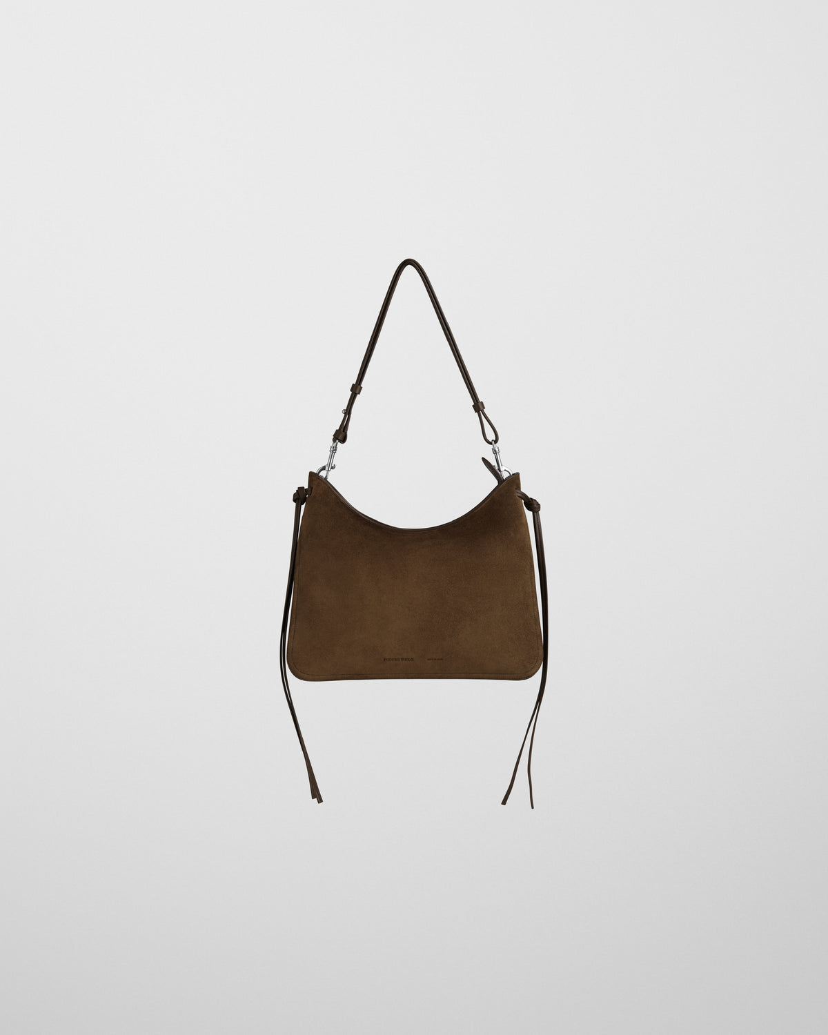 Phoebe Philo borsa a spalla Gig in camoscio kaki, silhouette boxy con lacci annodati e sottile tracolla regolabile.