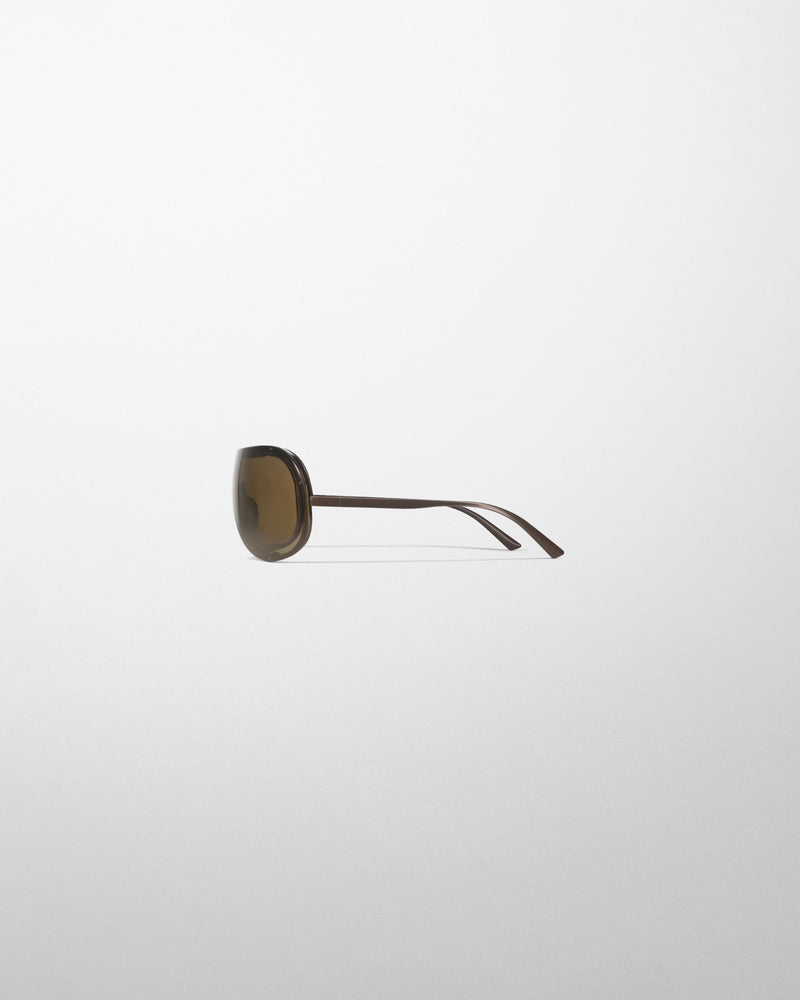 Phoebe Philo Beam Profilansicht: feines Metallgestell in Khaki und schmale Bügel, Luxus-Damensonnenbrille.