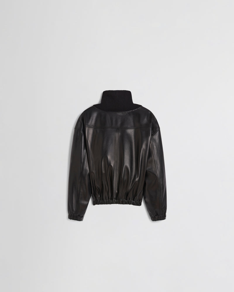 Phoebe Philo veste cuir noir dos lisse surpiqûres visibles ourlet élastiqué et col roulé côtelé