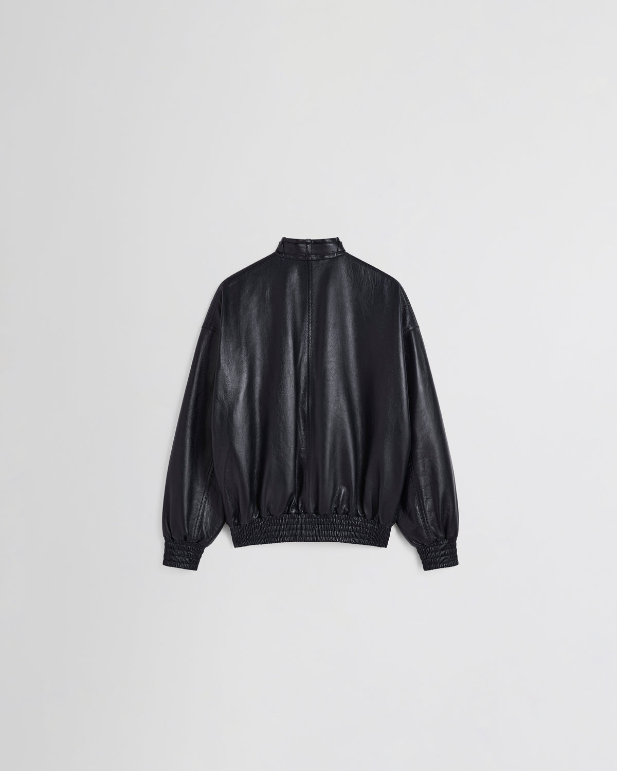 Phoebe Philo bomber cuir noir encre, vue dos, coupe volumineuse et ourlet élastiqué smocké