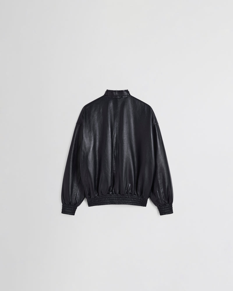 Phoebe Philo bomber cuir noir encre, vue dos, coupe volumineuse et ourlet élastiqué smocké