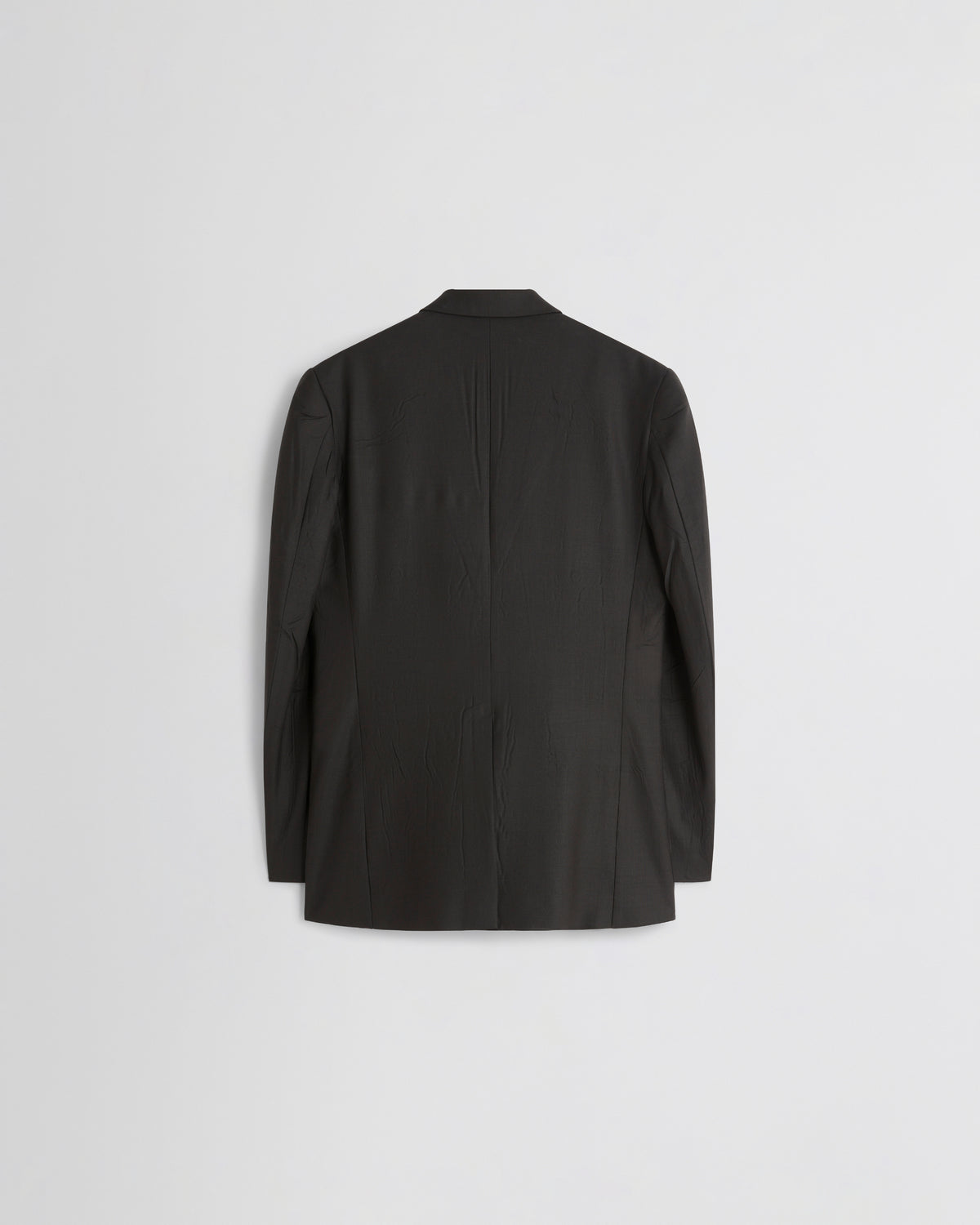 Phoebe Philo blazer femme dos, coupe ajustée laine vert bronze avec coutures apparentes structurées