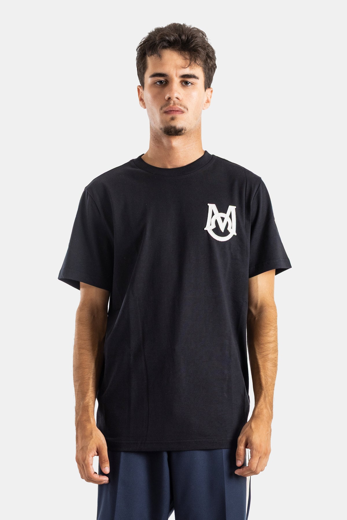 Moncler men's black cotton oversized crew neck t-shirt with short sleeves and an embroidered monogram
