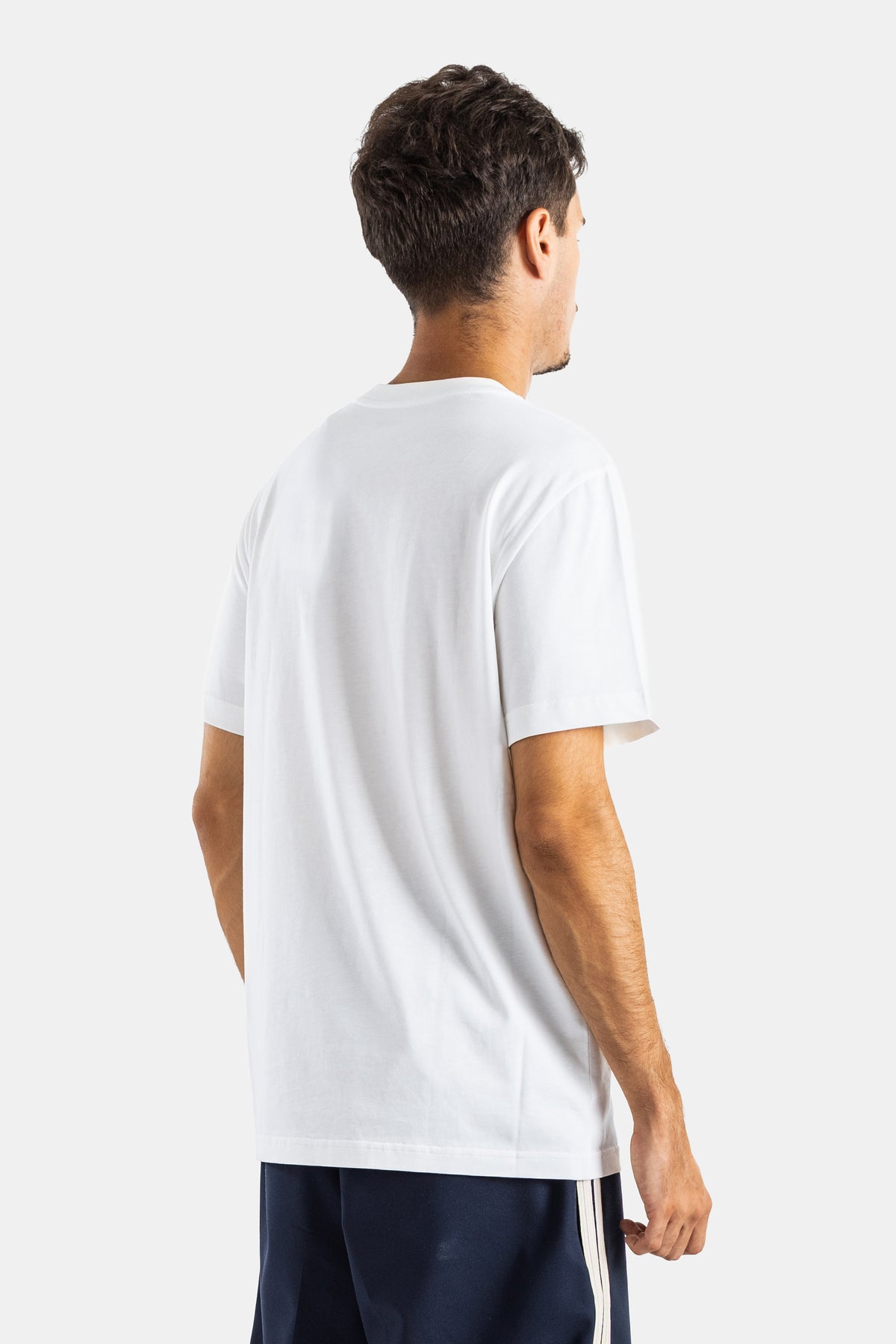 Back view of the Moncler men's white relaxed fit T-shirt in plain cotton jersey with a classic crewneck