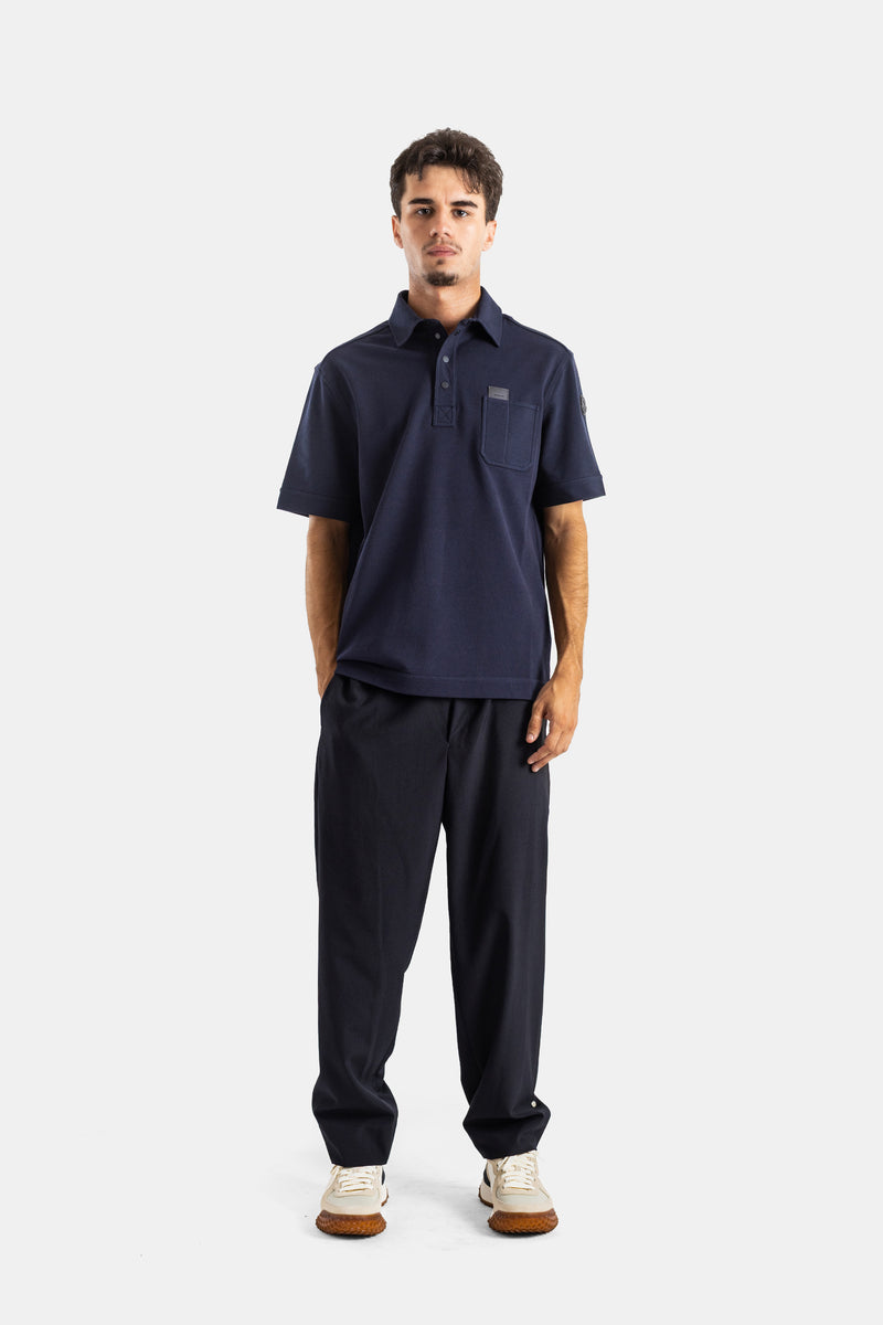 Moncler polo homme tenue complète look total navy pantalon large sneakers blanc style casual luxe