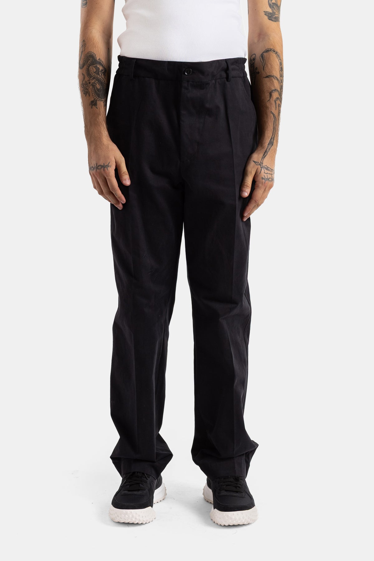 Moncler pantalon droit à pinces en coton noir coupe ample taille haute pour homme