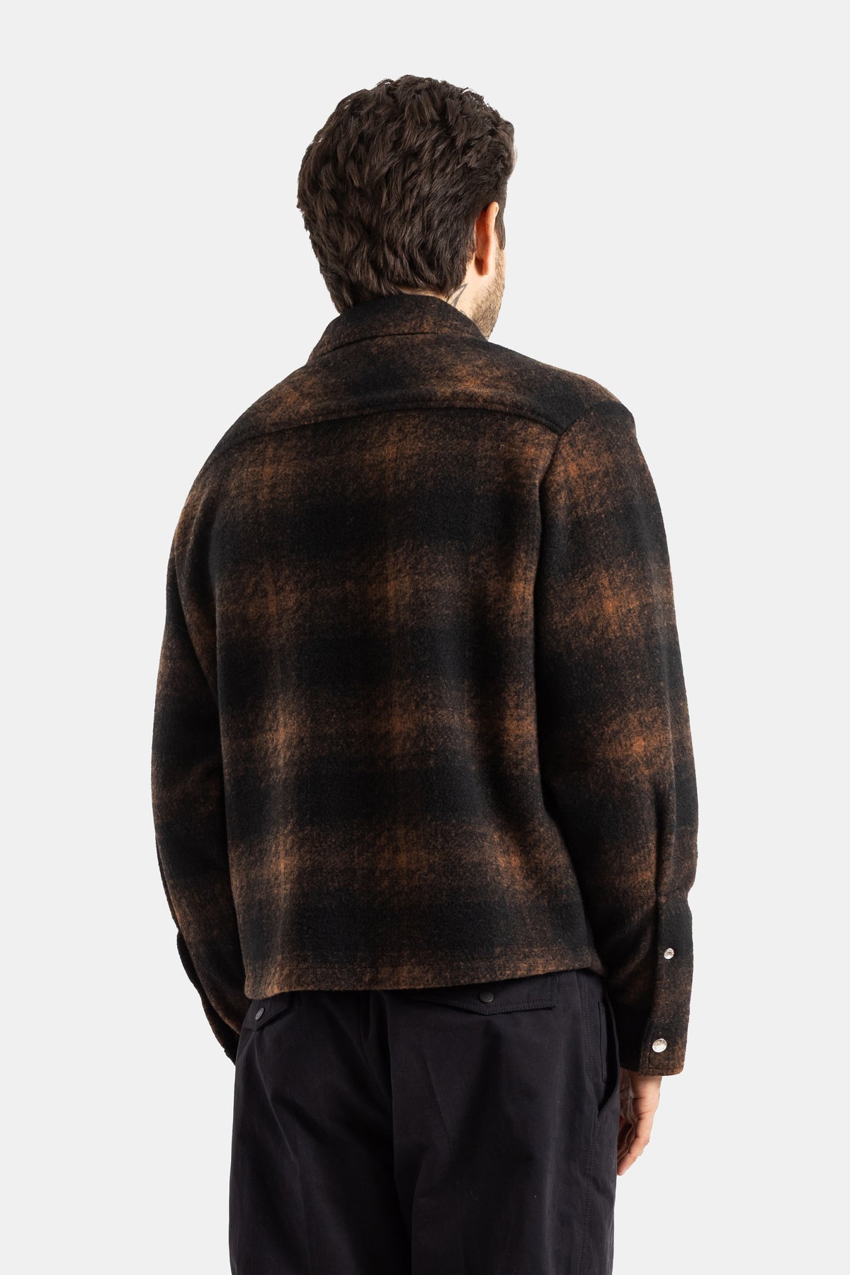 Moncler men's brown black gradient plaid wool jacket, back view, boxy fit and structured shoulder yoke.