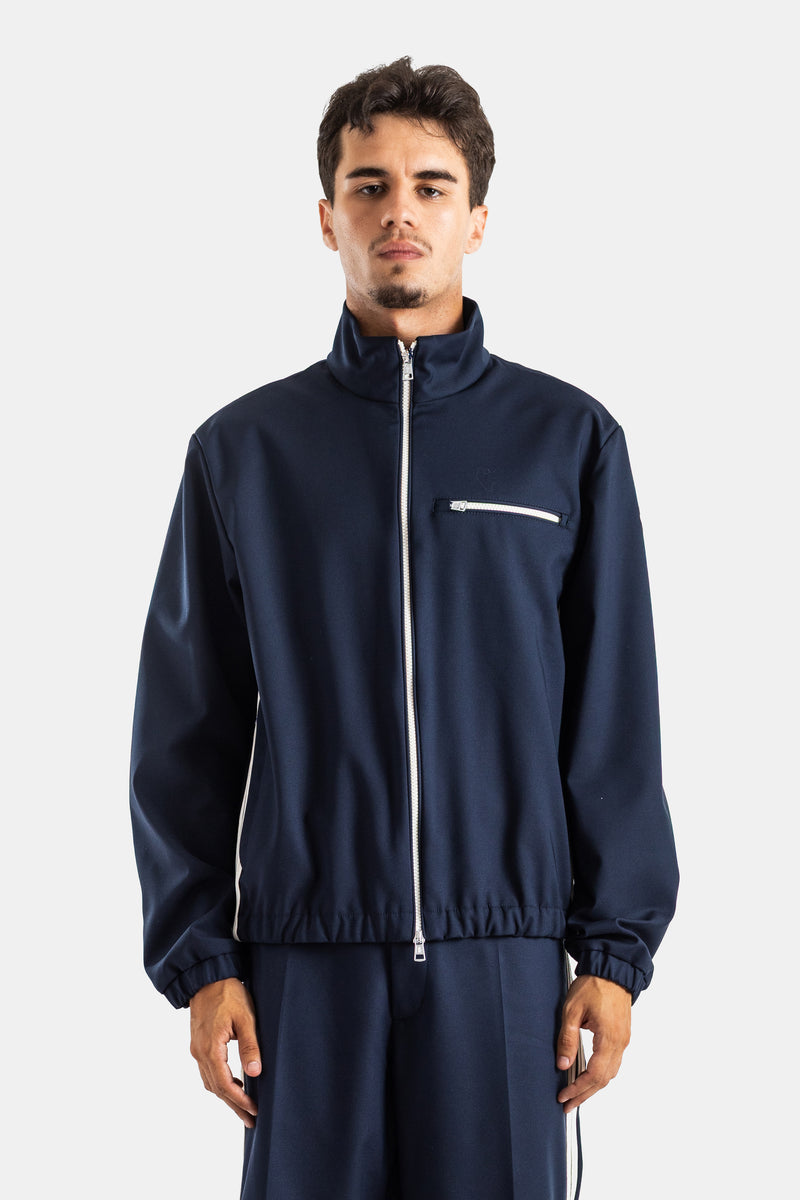 Moncler men's navy blue stretch Fourioun jacket, oversized zip style with high collar and silver details.