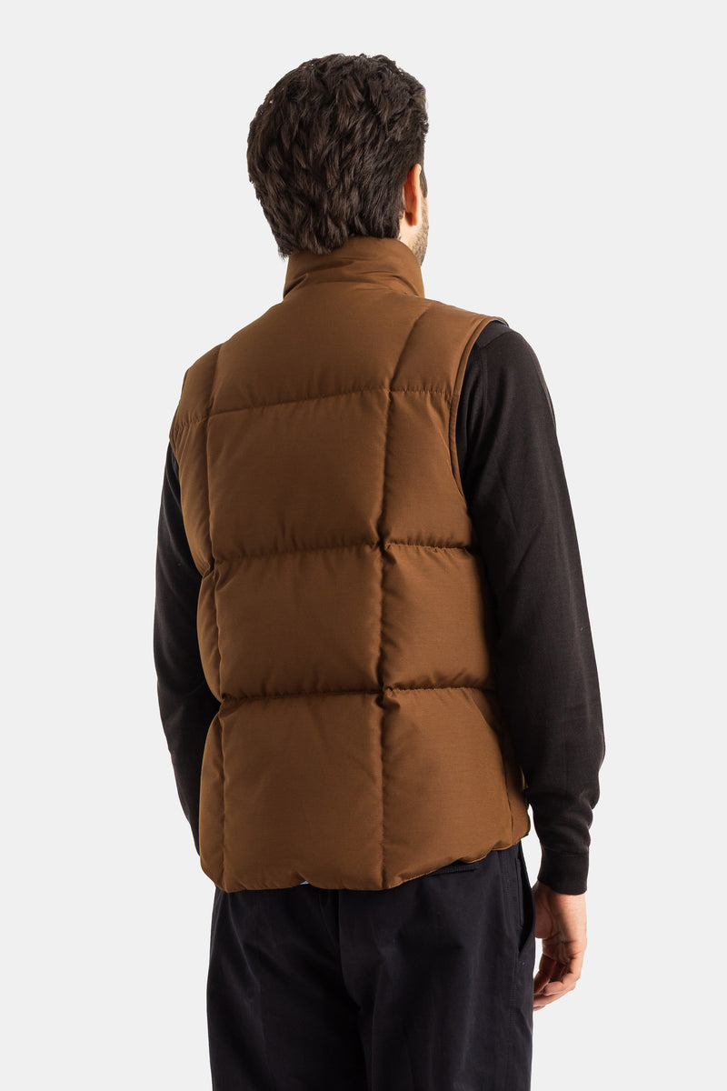 Moncler Brumelune men's brown quilted gilet back view showing horizontal stitching and topstitched collar