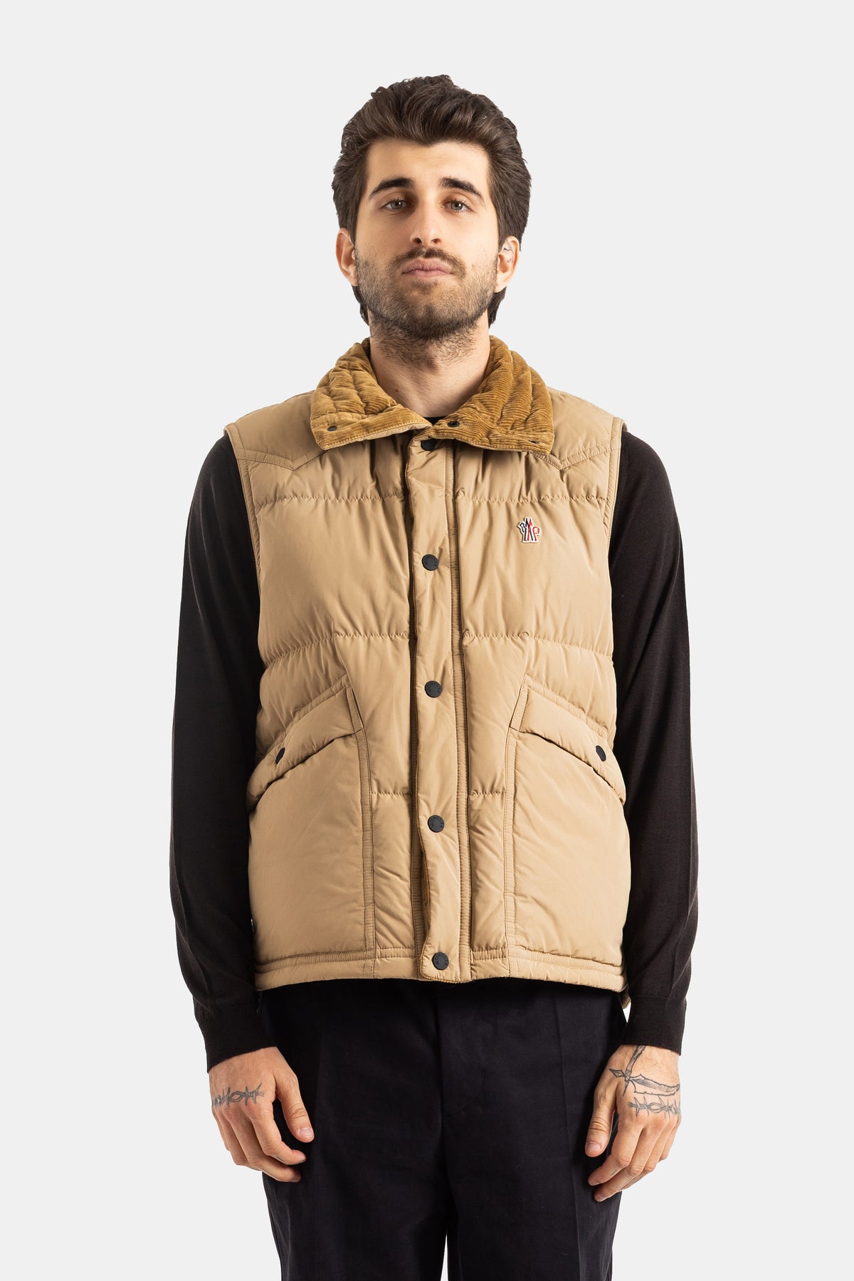 Moncler Grenoble Evans men's beige sleeveless down vest featuring a caramel corduroy collar, quilted.