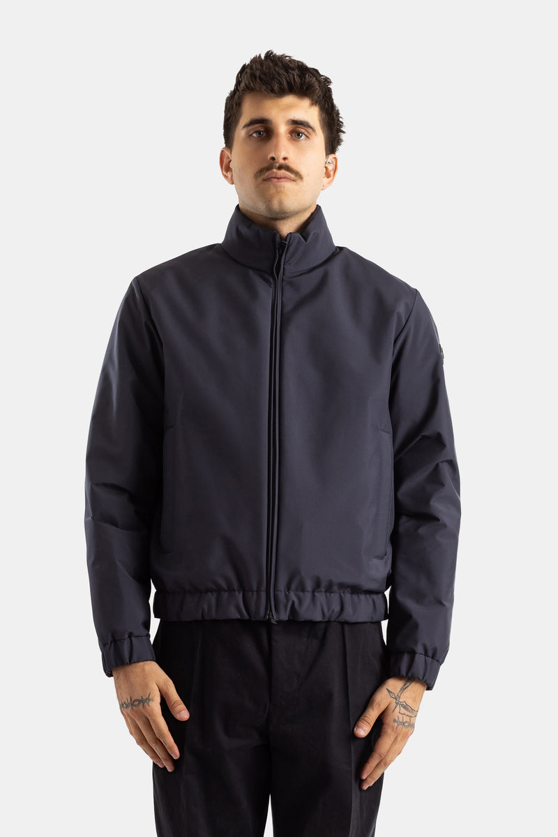 Moncler bomber Luserna homme coupe courte col montant bleu marine tissu technique imperméable