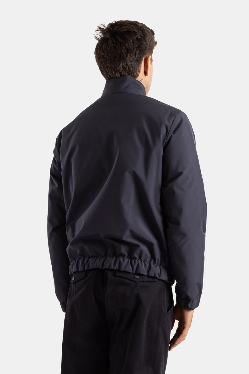 Moncler Luserna dos bomber bleu marine homme bande élastique ceinture tissu technique structuré
