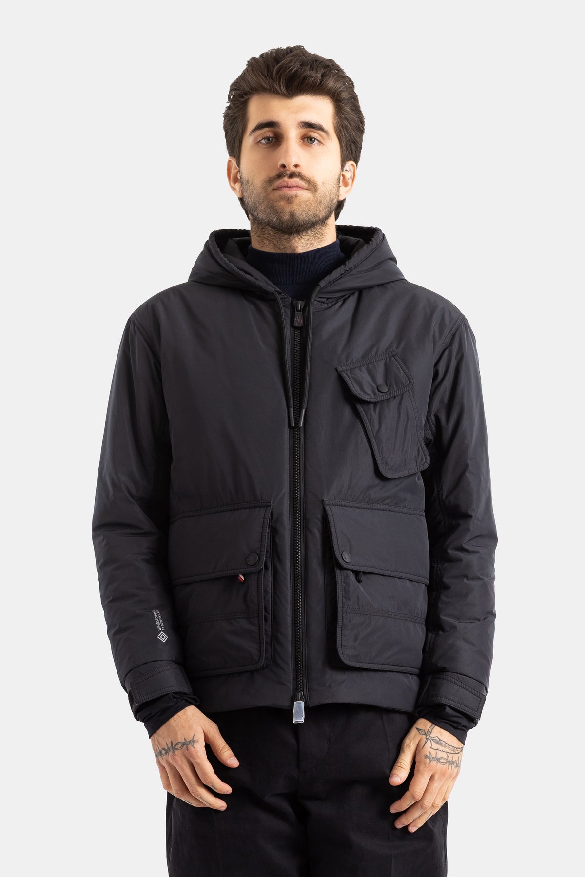 Moncler Grenoble Ober hooded jacket with cargo pockets, oversized fit in black technical nylon fabric.