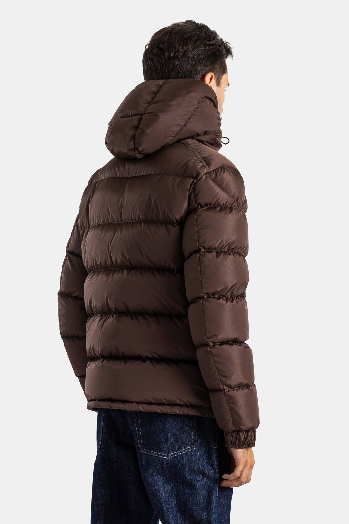 Moncler Maya short brown down jacket back view featuring voluminous hood, quilting and elasticated cuffs