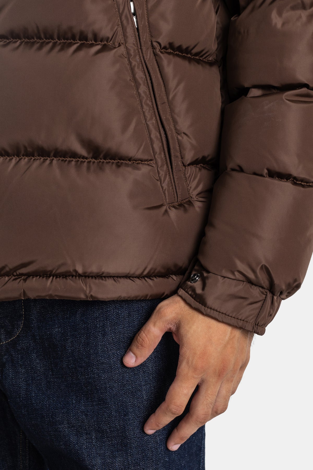Moncler Maya detail of elasticated wrist cuff on men's short down jacket in matte chocolate brown nylon
