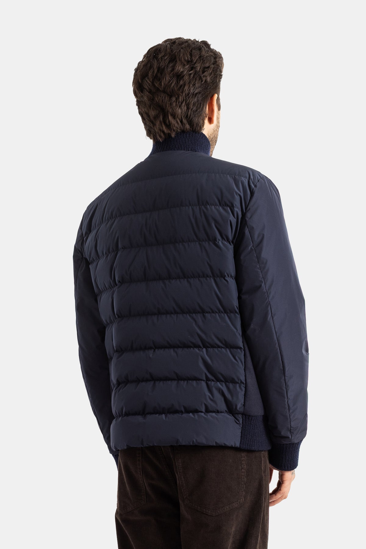 Moncler Urvalis blouson dos matelassé bleu marine bandes horizontales rembourrées col tricot homme