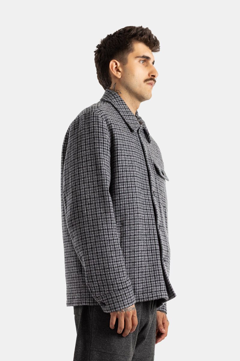 Moncler veste-chemise homme profil latéral carreaux pied-de-poule gris texture laine poches plaquées