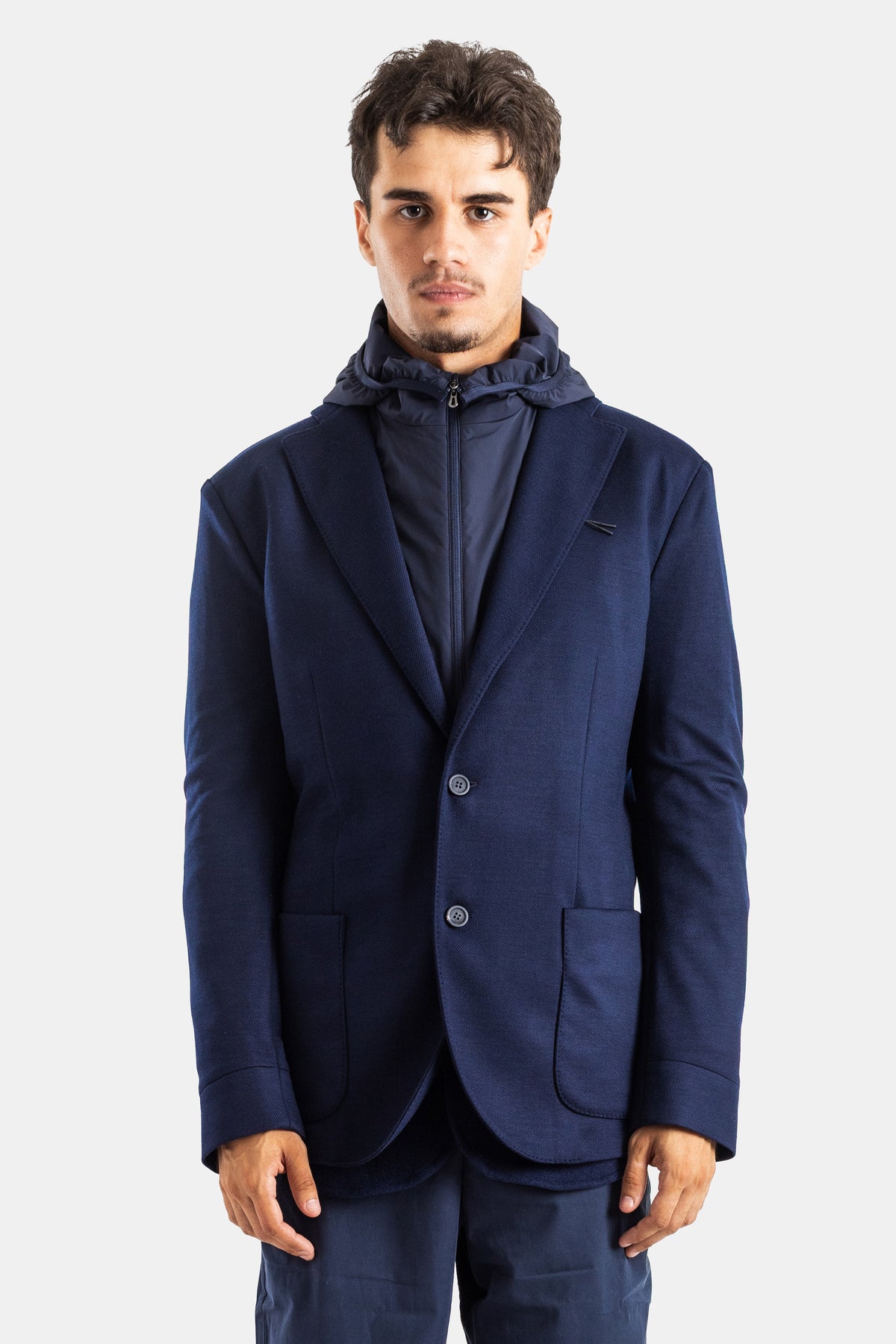 Sease navy blue men's structured hybrid blazer featuring an integrated hooded technical jersey gilet.