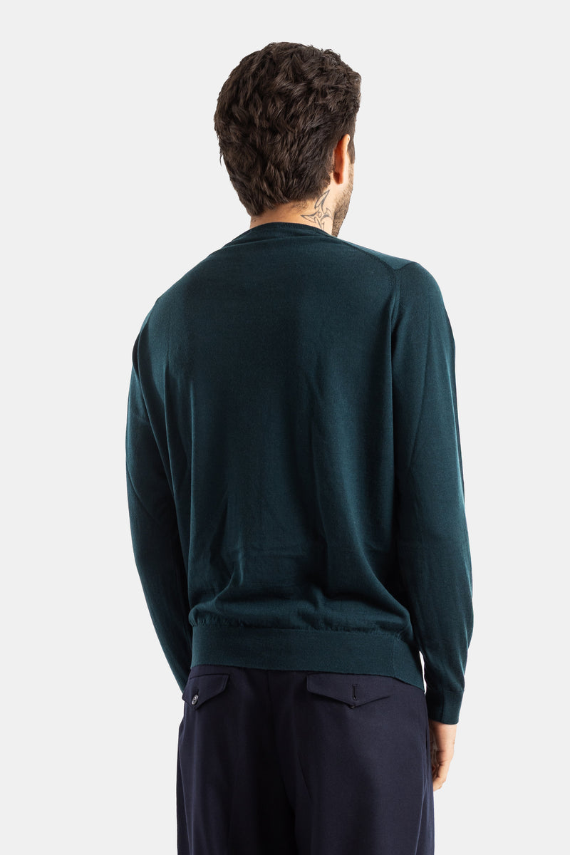 Smedley pull Lundy dos homme tatouage nuque mérinos vert sapin finitions côtelées pantalon bleu marine