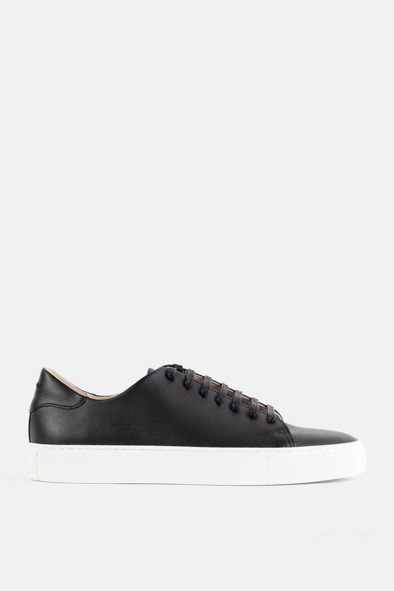 Sneakers en cuir lisse noir semelle blanche