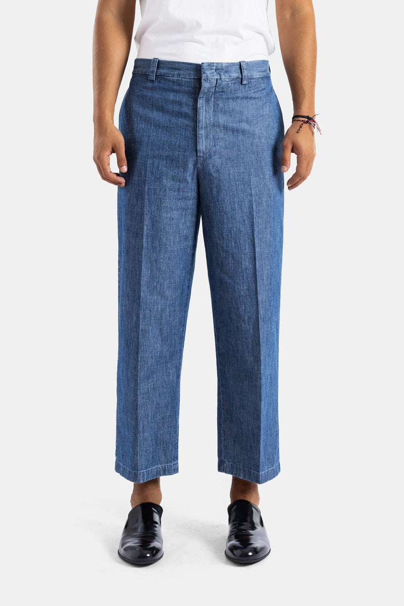 Jil Sander pantalon chambray coton indigo lavé large pli central coupe ample 7/8 homme SS26