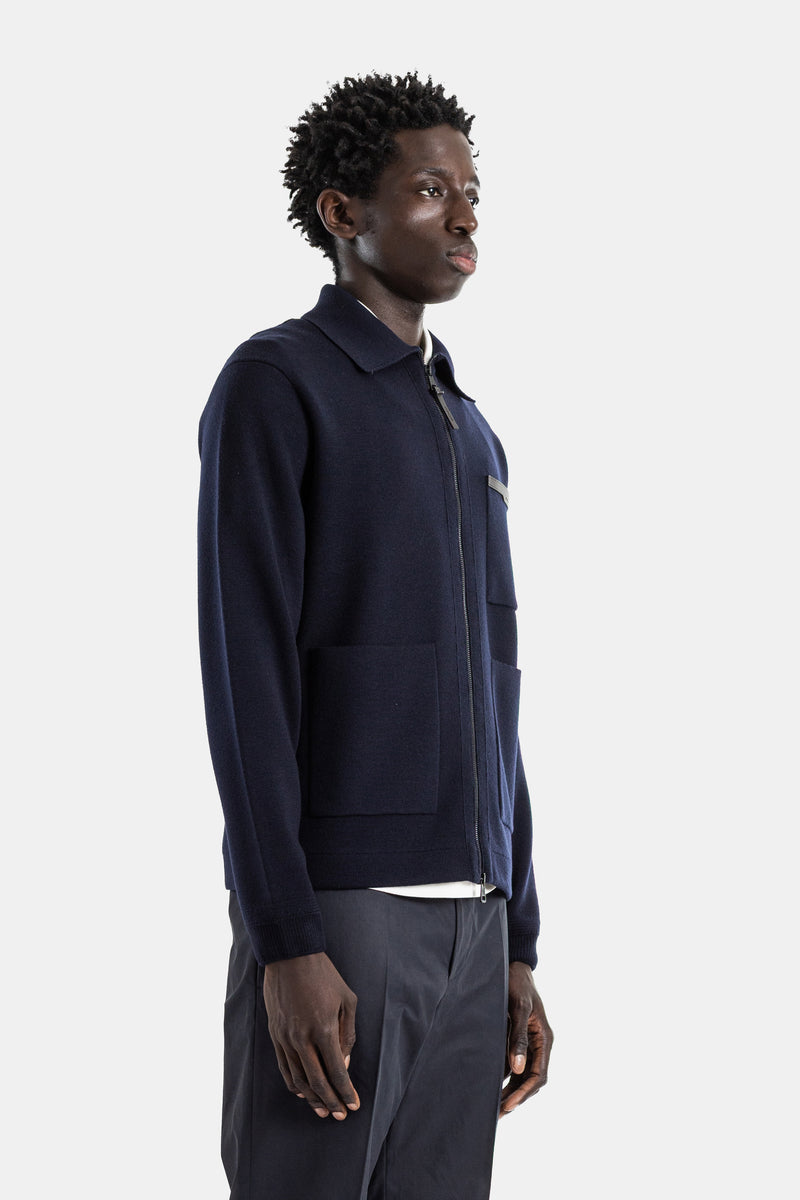Cardigan zippé laine vierge navy col polo poches plaquées passepoil cuir