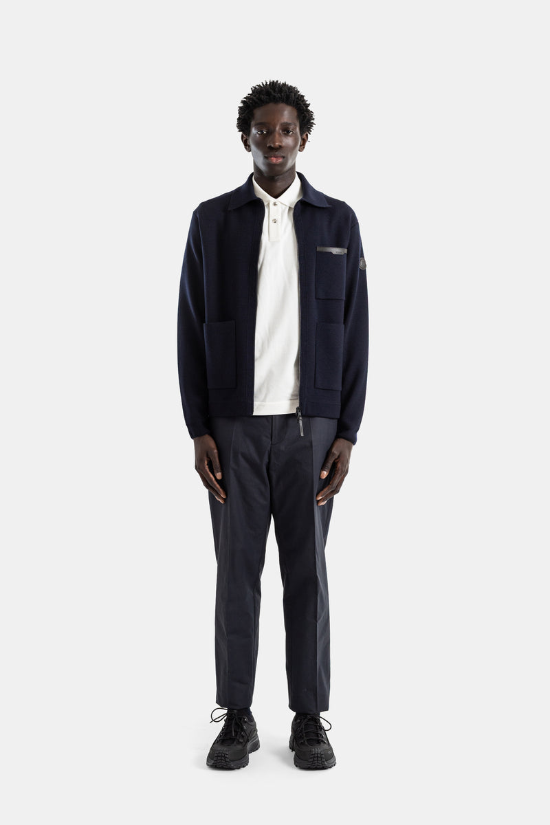 Cardigan zippé laine vierge navy col polo poches plaquées passepoil cuir