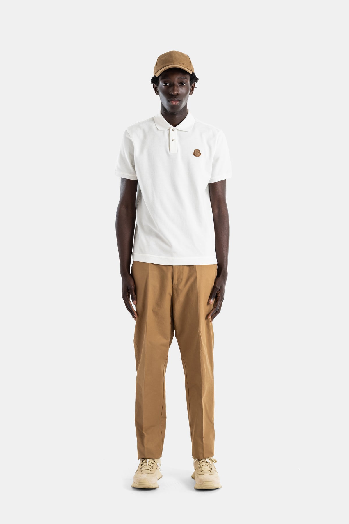 Polo coton piqué blanc ivoire patch logo cuir