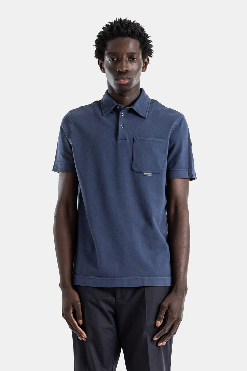 Polo coton piqué bleu ardoise lavé poche poitrine logo métal