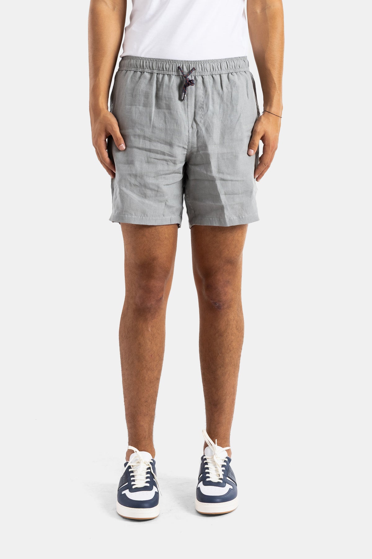 Sease Cod shorts in pearl grey linen relaxed fit elasticated waist drawstrings side zips men SS26