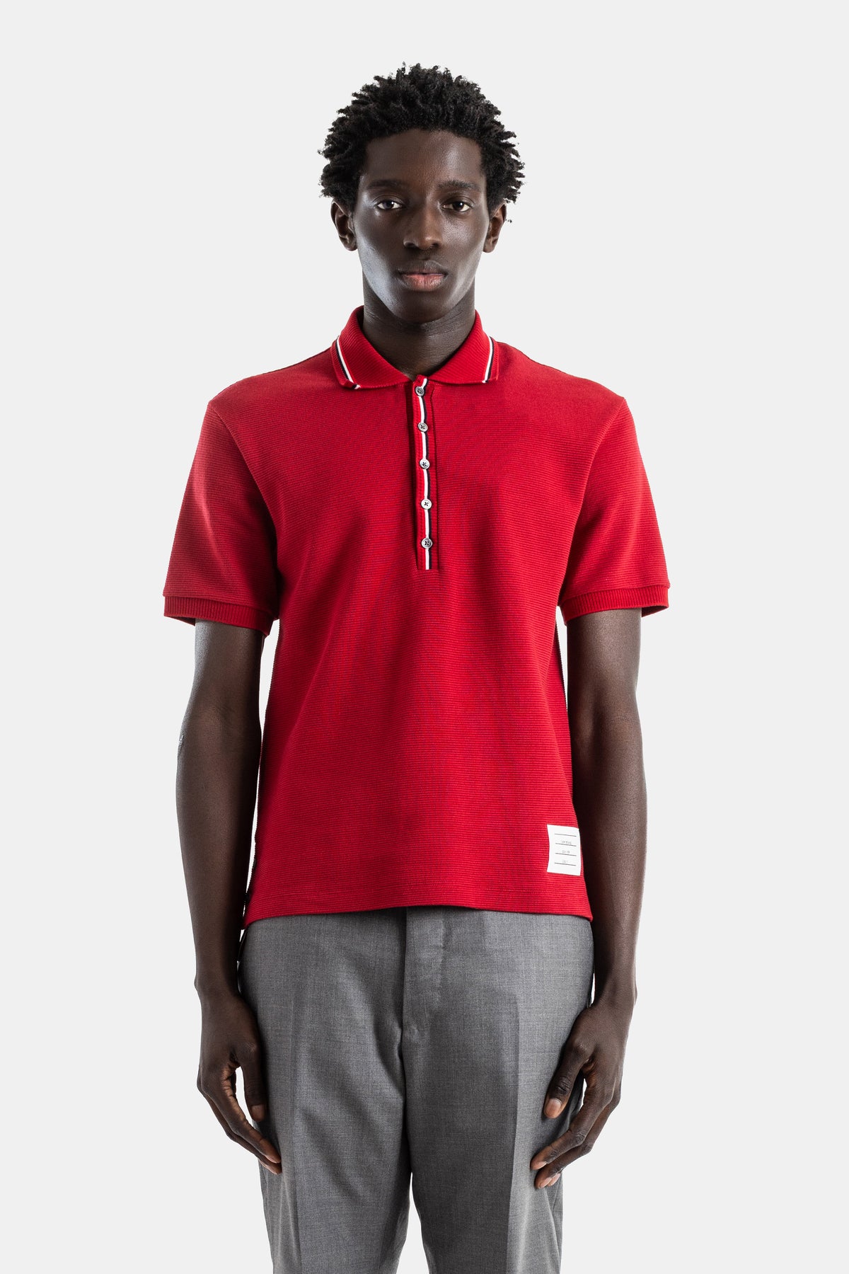 Thom Browne red waffle cotton polo tricolour trim collar and button placket ribbed cuffs FW25