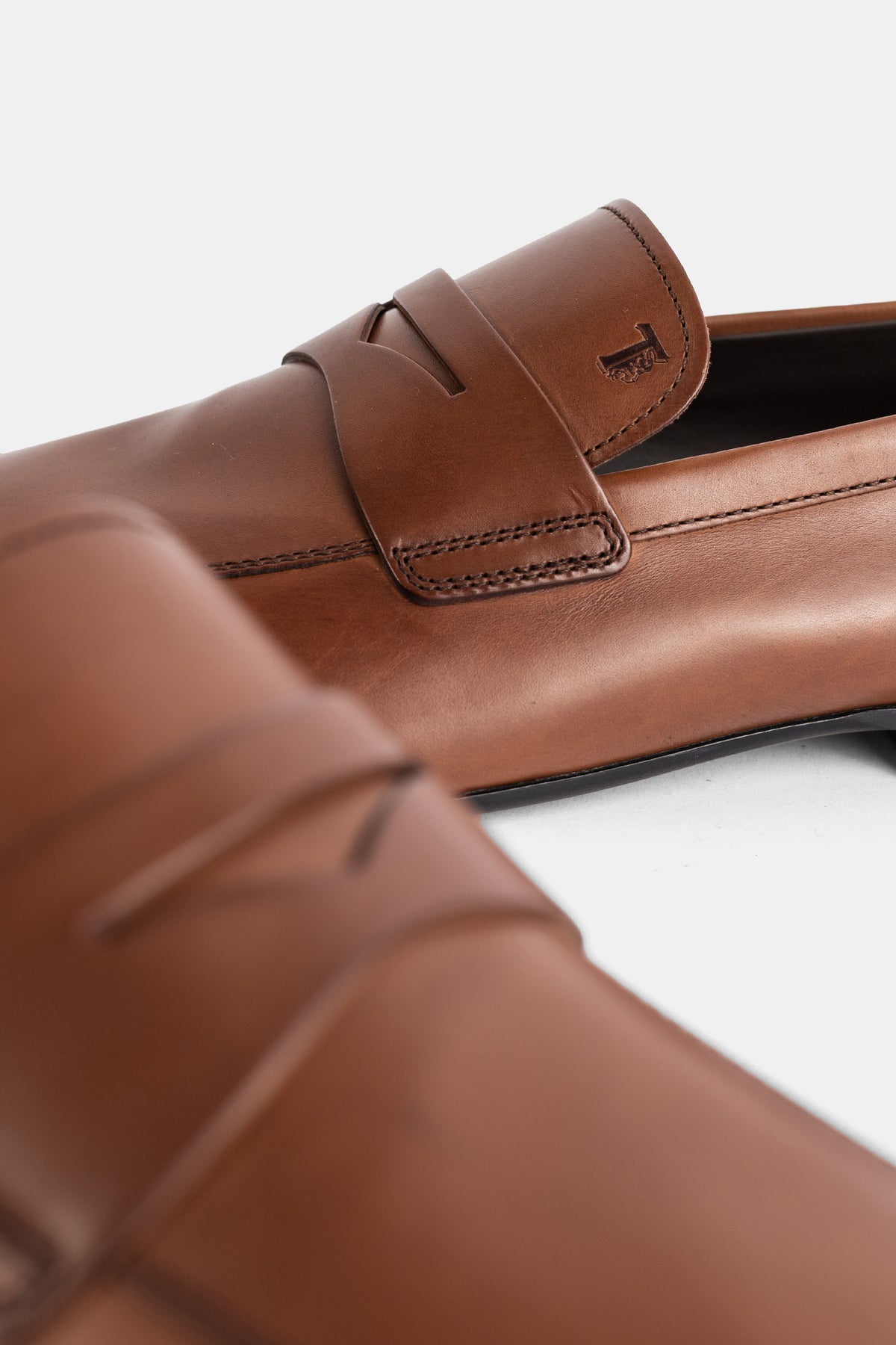 Brown Slip-On Loafers with Embossed Logo