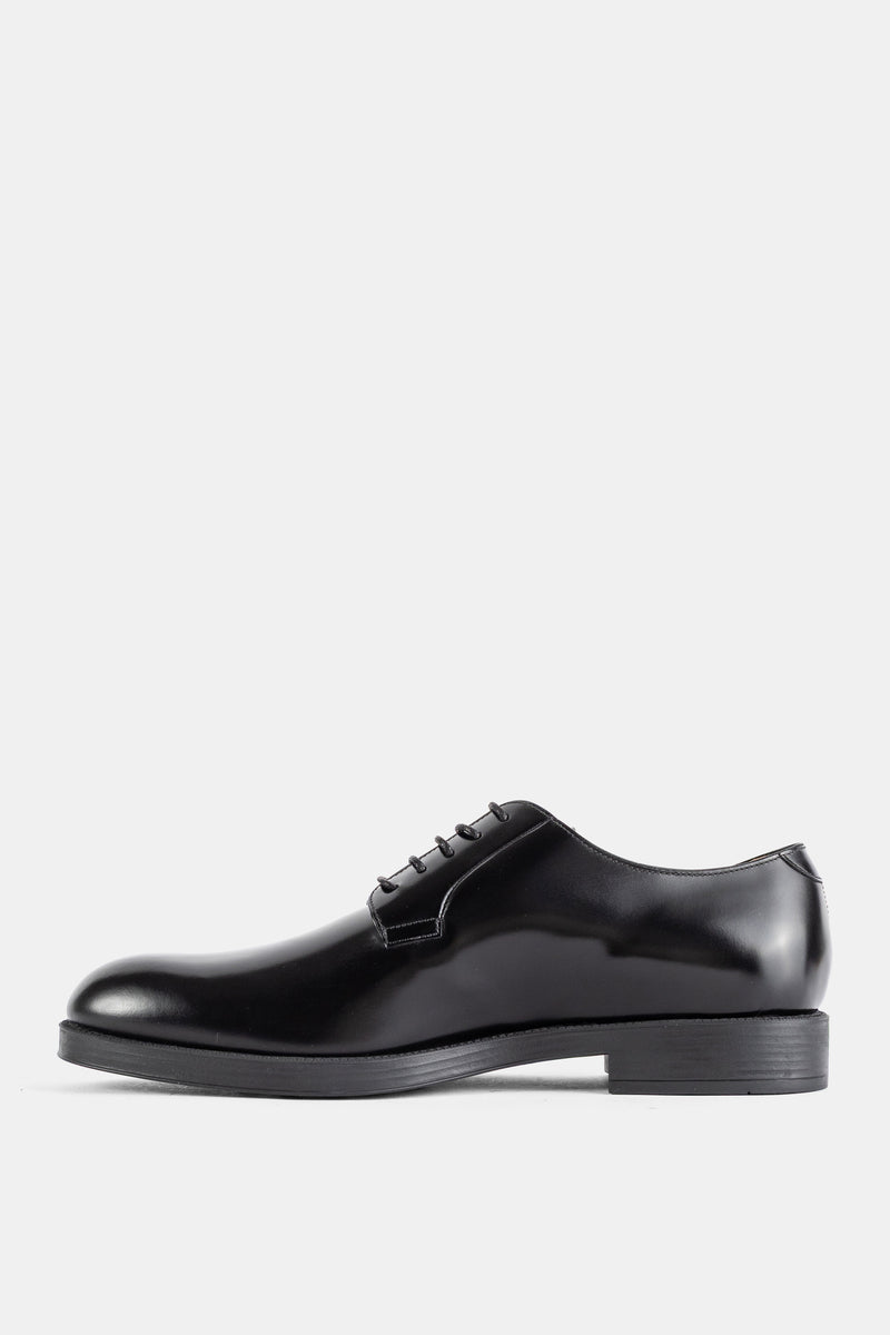 Derby lacée en cuir poli noir
